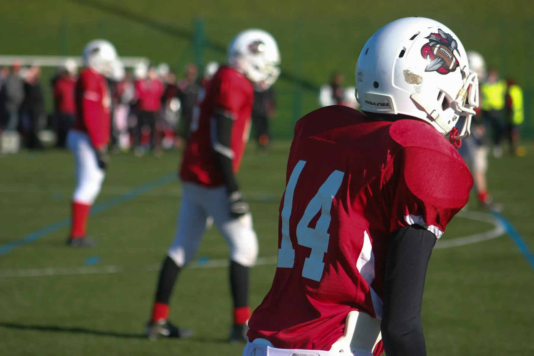 Young football player on the field during a game