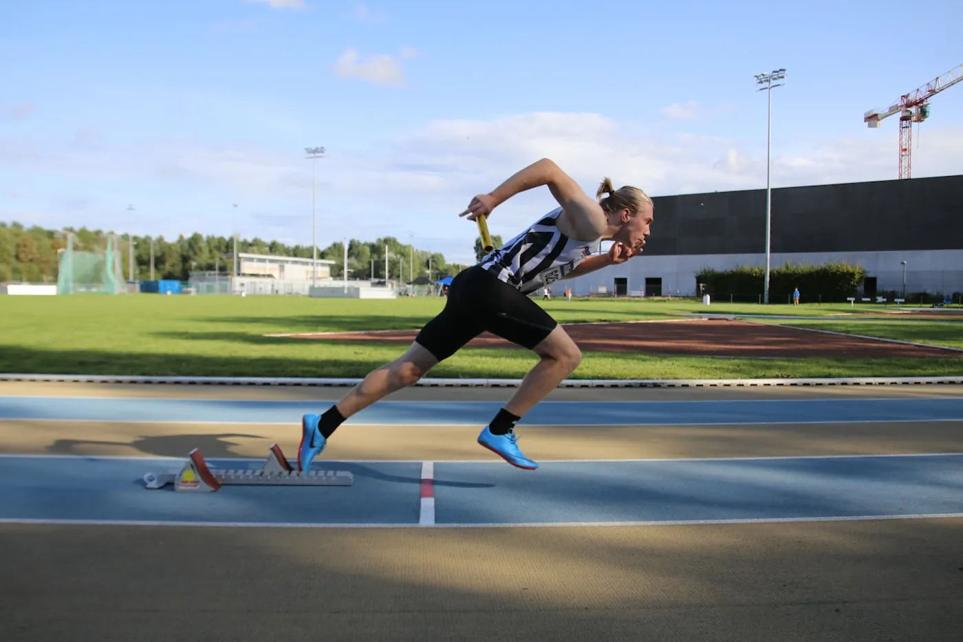 Athlete accelerating in a sprint